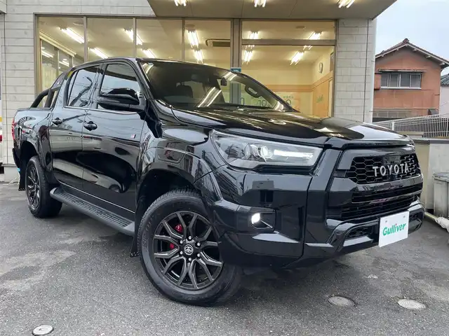 トヨタ ハイラックス Z GRスポーツ 愛知県 2023(令5)年 1.9万km アティチュードブラックマイカ /当店買取/1オーナー/禁煙//純正ディスプレイオーディオナビ//360度カメラ//Bluetooth/FM/AM/USB/ETC//レーダークルーズコントロール//PCS/LDA/RSA/Pソナー//GR専用革巻きステアリング//GR専用ハーフレザーシート/運転席Pシート//GRマッドラップ//LEDヘッド/Aライト/LEDフォグ/AHB//パドルシフト//純正Fマット/社外マフラー/ドラレコ（前）//保証書/取説/ナビ取説/スマートキー/スペアキー
