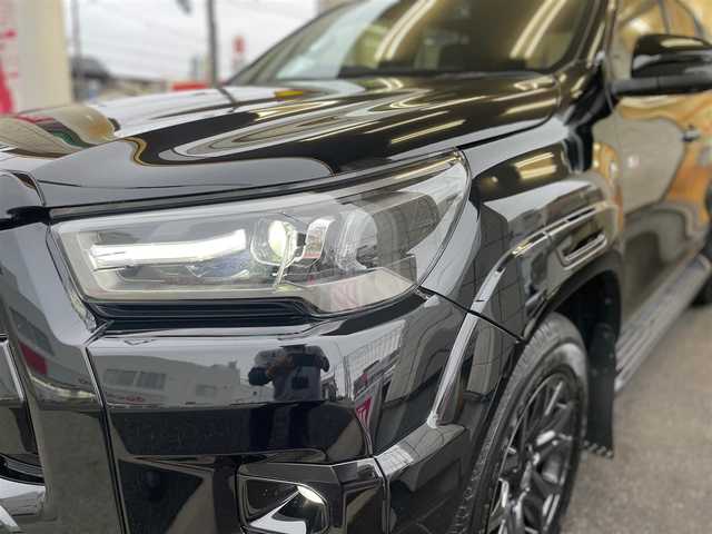 トヨタ ハイラックス Z GRスポーツ 愛知県 2023(令5)年 1.9万km アティチュードブラックマイカ /当店買取/1オーナー/禁煙//純正ディスプレイオーディオナビ//360度カメラ//Bluetooth/FM/AM/USB/ETC//レーダークルーズコントロール//PCS/LDA/RSA/Pソナー//GR専用革巻きステアリング//GR専用ハーフレザーシート/運転席Pシート//GRマッドラップ//LEDヘッド/Aライト/LEDフォグ/AHB//パドルシフト//純正Fマット/社外マフラー/ドラレコ（前）//保証書/取説/ナビ取説/スマートキー/スペアキー