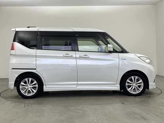 スズキ ソリオ HV MZ Dカメラ ブレーキS 兵庫県 2016(平28)年 4.4万km ピュアホワイトP ・純正ナビ＆TV＆CD＆DVD＆BT/・全方位カメラ/・両側パワースライドドア/・デュアルカメラブレーキサポート/・車線逸脱警報機能/・誤発進抑制機能/・ETC/・クルーズコントロール/・スマートキー/・プッシュスタート/・フロアマット/・HIDヘッドライト/・フォグ/・オートライト/・横滑り防止装置/・アイドリングストップ