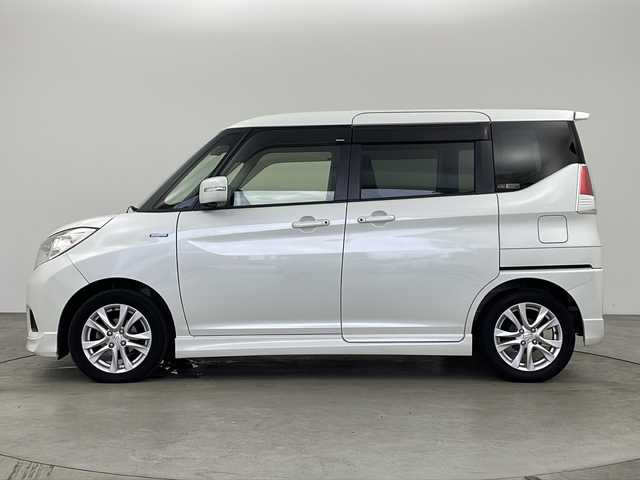 スズキ ソリオ HV MZ Dカメラ ブレーキS 兵庫県 2016(平28)年 4.4万km ピュアホワイトP ・純正ナビ＆TV＆CD＆DVD＆BT/・全方位カメラ/・両側パワースライドドア/・デュアルカメラブレーキサポート/・車線逸脱警報機能/・誤発進抑制機能/・ETC/・クルーズコントロール/・スマートキー/・プッシュスタート/・フロアマット/・HIDヘッドライト/・フォグ/・オートライト/・横滑り防止装置/・アイドリングストップ