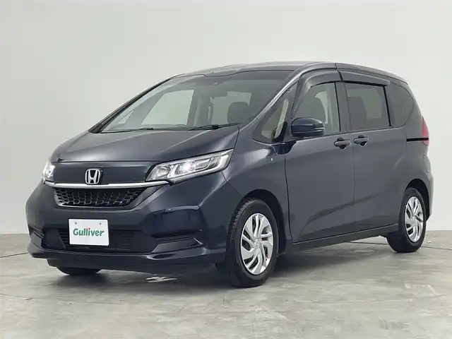 ホンダ フリード G ホンダセンシング 群馬県 2020(令2)年 3.4万km ミッドナイトブルービームM フリップダウンモニター　社外8インチナビ　バックカメラ　レーダークルーズコントロール　両側パワースライドドア　LEDライト　AHB　シートヒーター　ステアリングリモコン　ETC　スマートキー　禁煙車