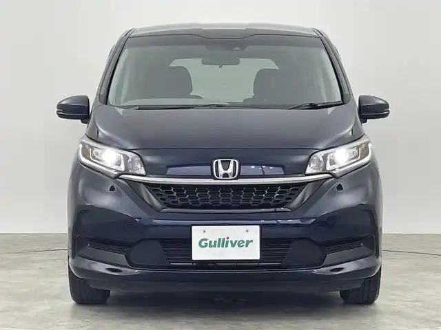 ホンダ フリード G ホンダセンシング 群馬県 2020(令2)年 3.4万km ミッドナイトブルービームM フリップダウンモニター　社外8インチナビ　バックカメラ　レーダークルーズコントロール　両側パワースライドドア　LEDライト　AHB　シートヒーター　ステアリングリモコン　ETC　スマートキー　禁煙車
