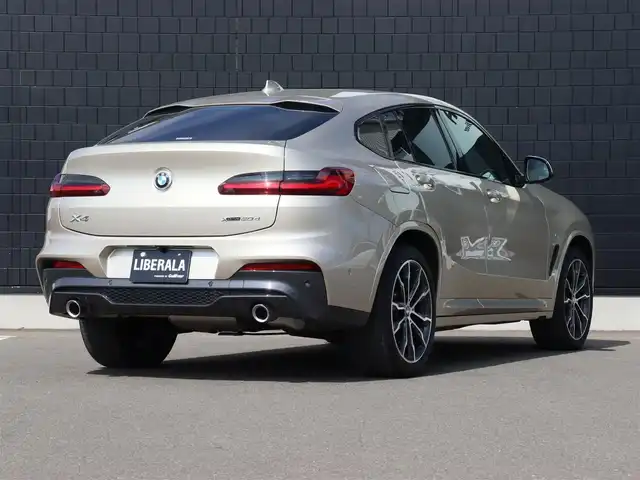 ＢＭＷ Ｘ４ xDrive 20d Mスポーツ 宮城県 2020(令2)年 2.6万km ゴールド ワンオーナー/純正ナビＴＶ/・フルセグ・ＢＴ・ＵＳＢ/パノラマサンルーフ/純正オプション２０インチＡＷ/ヘッドアップディスプレイ/パドルシフト/アダプティブクルーズコントロール/全方位カメラ/ブラインドスポットモニター/ブラウンレザーシート/全席シートヒーター/ミラー一体型ＥＴＣ/オートハイビーム/オートブレーキホールド/パワーバックドア/ダウンヒルアシスト/ワイヤレス充電/ドライブモードセレクト/ＬＥＤヘッドライト/前後フォグライト/カラーコード：Ｃ１Ｎ　サン・ストーン