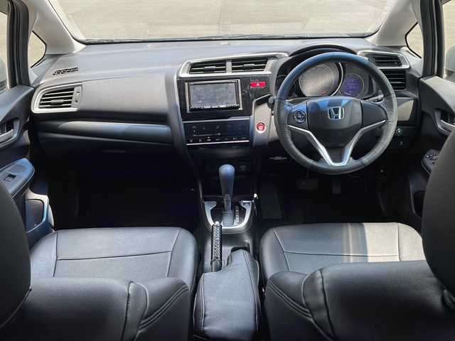 ホンダ フィット 13G Lパッケージ 鹿児島県 2014(平26)年 5.4万km アラバスターシルバーメタリック 社外7インチＳＤナビ/　　CD/DVD/フルセグＴＶ/バックカメラ/LEDヘッドライト/純正15インチアルミホイール/アイドリングストップ/スマートキー/ETC/オートライト/ＭＴモード付FAT