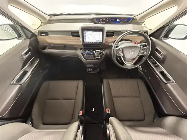 ホンダ フリード＋ ハイブリット G 佐賀県 2023(令5)年 2.2万km シルバーミストグリーンM 純正9インチナビ/フルセグＴＶ/Bluetooth/CD/DVD/ビルトインETC/前方・後方ドライブレコーダー/両側パワースライドドア/レーダークルーズコントロール/衝突被害軽減ブレーキ/レーンキープアシスト/先行車発進お知らせ機能/標識認知機能/シートヒーター/純正15インチアルミホイール/純正フロアマット