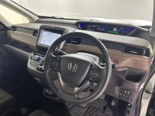 ホンダ フリード＋ ハイブリット G 佐賀県 2023(令5)年 2.2万km シルバーミストグリーンM 純正9インチナビ/フルセグＴＶ/Bluetooth/CD/DVD/ビルトインETC/前方・後方ドライブレコーダー/両側パワースライドドア/レーダークルーズコントロール/衝突被害軽減ブレーキ/レーンキープアシスト/先行車発進お知らせ機能/標識認知機能/シートヒーター/純正15インチアルミホイール/純正フロアマット