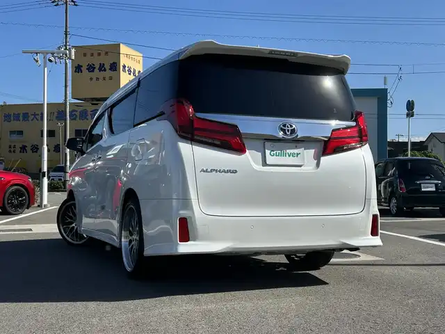 トヨタ アルファード S Cパッケージ 愛媛県 2019(令1)年 2.9万km ホワイトパールクリスタルシャイン 登録時走行距離：28648km/メーカーOP純正ナビ/AM/FM/フルセグTV/DVD/CD/純正後席モニター/サンルーフ/前後ドラレコ/ETC/バックカメラ/デジタルミラー/追従クルコン/レーンキープアシスト/パーキングアシスト/衝突軽減システム/横滑り防止装置/両側パワスラ/電動リアゲート/シートメモリー/ハンドルヒーター/LEDヘッドライト/オートライト/エンジンスタートボタン/スマートキー/純正アルミホイール/純正フロアマット