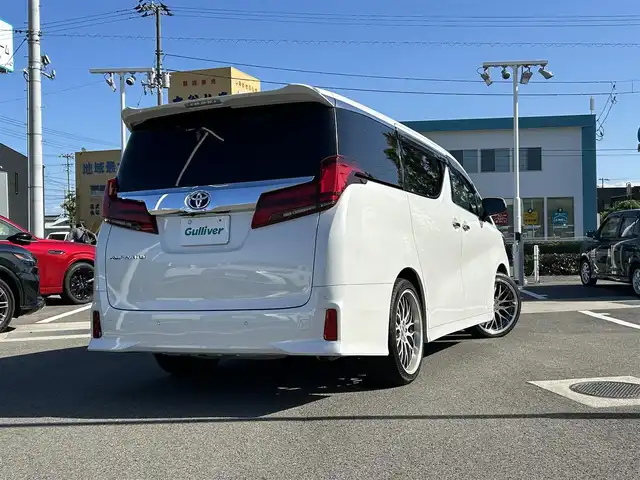トヨタ アルファード S Cパッケージ 愛媛県 2019(令1)年 2.9万km ホワイトパールクリスタルシャイン 登録時走行距離：28648km/メーカーOP純正ナビ/AM/FM/フルセグTV/DVD/CD/純正後席モニター/サンルーフ/前後ドラレコ/ETC/バックカメラ/デジタルミラー/追従クルコン/レーンキープアシスト/パーキングアシスト/衝突軽減システム/横滑り防止装置/両側パワスラ/電動リアゲート/シートメモリー/ハンドルヒーター/LEDヘッドライト/オートライト/エンジンスタートボタン/スマートキー/純正アルミホイール/純正フロアマット