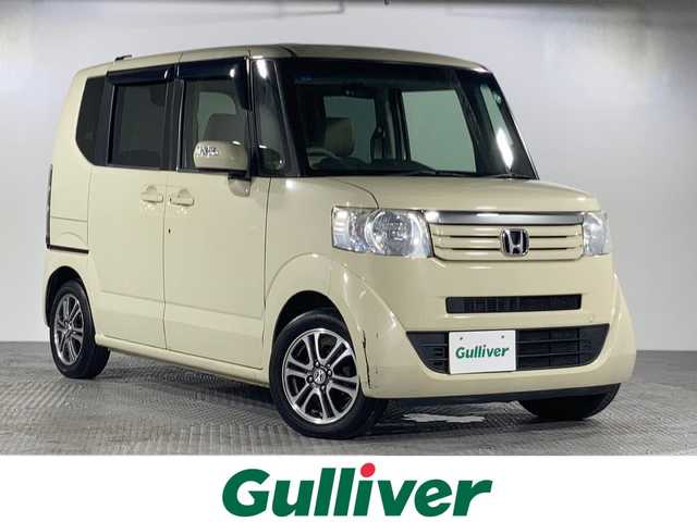 ホンダ Ｎ ＢＯＸ G Lパッケージ 沖縄県 2014(平26)年 10.3万km ヒダマリアイボリーパール 禁煙車/純正ナビ【VXM-145VFi】　/フルセグ　Ｂｌｕｅｔｏｏｔｈ　ＤＶＤ再生　/フリップダウンモニター　/大型ルーフコンソール　/両側パワースライドドア　/ＥＴＣ　/バックカメラ　/ステアリングスイッチ/ベンチシート/スマートキー/純正14インチアルミ