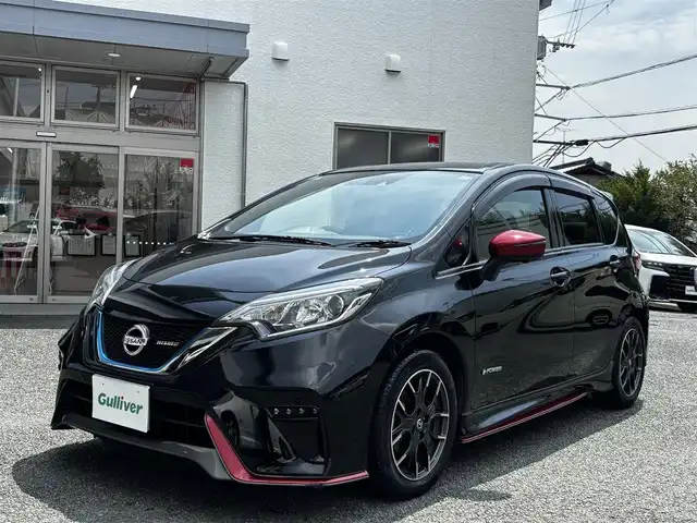 日産 ノート e－パワー ニスモ 熊本県 2017(平29)年 10.5万km スーパーブラック ワンオーナー/純正ナビ（MM316D-W）/【フルセグTV/Bluetooth/CD/DVD】/アラウンドビューカメラ/衝突軽減防止装置/レーンキープアシスト/車両接近通知装置/コーナーセンサー/純正１６インチAW/オートLEDライト/革巻きステアリング/ステアリングスイッチ/ETC/純正フロアマット/純正ドアバイザー/横滑り防止装置/スペアキー/保証書/取扱説明書