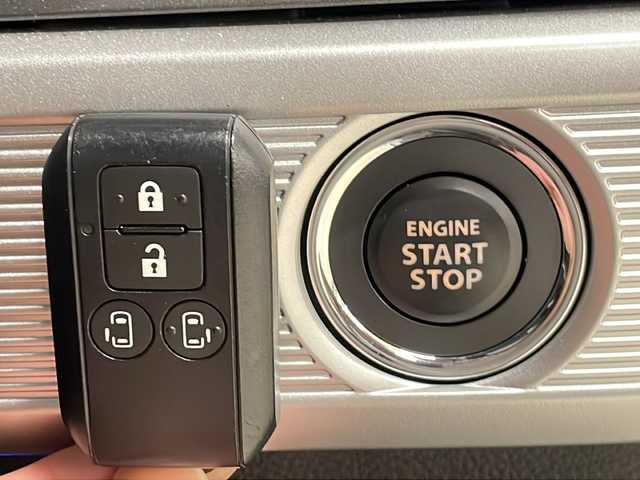 スズキ スペーシア ギア HYBRID XZ 熊本県 2021(令3)年 1.1万km オフブルーメタリック/ガンメタリック2トーンルーフ 純正SDナビ（ラジオ、フルセグ、BT、CD、DVD、SD、USB）/ETC/全方位カメラ/クルーズコントロール/ステアリングリモコン/シートヒーター/両側パワスラ/ヘッドアップディスプレイ/クリアランスソナー/レーンキープ/衝突被害軽減ブレーキ/横滑り防止/オートハイビーム/オートライト/フロアマット/ドアバイザー/リアサーキュレーター/プッシュスタート/スマートキー×2