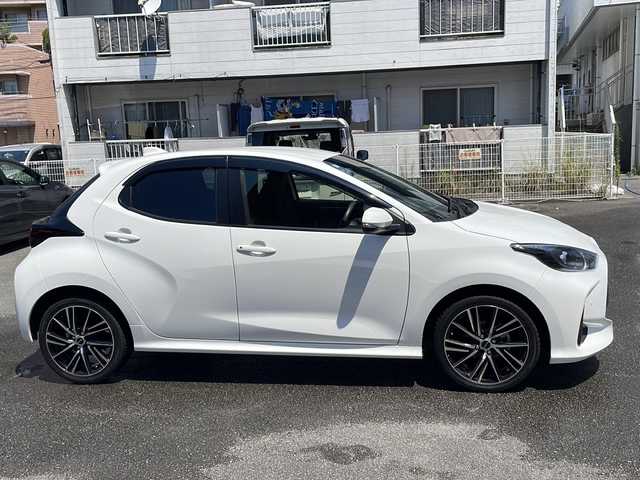 トヨタ ヤリス ハイブリッド X 宮崎県 2022(令4)年 1.7万km スーパーホワイトⅡ 純正ナビ/BT/USB/バックカメラ・ETC/トヨタセーフティセンス/レーンキープアシスト/パーキングサポートブレーキ/レーダークルーズコントロール/ドライブレコーダー/社外17インチアルミホイール/オートハイビーム/ウィンカーミラー/キーレスキー/純正フロアマット/ドアバイザー