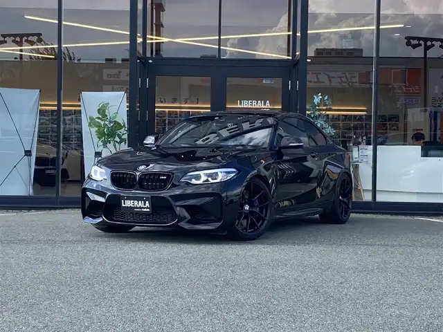 ＢＭＷ Ｍ２ エディションブラックシャドウ 福岡県 2018(平30)年 2.9万km 黒 ・クルーズコントロール/・純正ナビ/BT/USB/・バックカメラ/・黒革シート/シートヒーター/・ドライブレコーダー/・ETC/・純正19AW/・KW車高調/・100台限定車/・保証書/・取扱説明書/・スペアキー/・JQカーボンパドルシフト/・カーボンリアディフューザー/・カーボンドアミラーカバー
