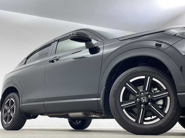 ホンダ ヴェゼル ハイブリッド e:HEV X 新潟県 2023(令5)年 0.9万km クリスタルブラックパール 純正オプションナビ/(ＢＴ／ＦＭ／ＡＭ／ＤＶＤ／フルセグＴＶ）/バックカメラ/ステアリングスイッチ/パドルシフト/置くだけ充電/電格ミラー/ウィンカーミラー/ヘッドライトレベライザー/ドアバイザー/ＥＴＣ