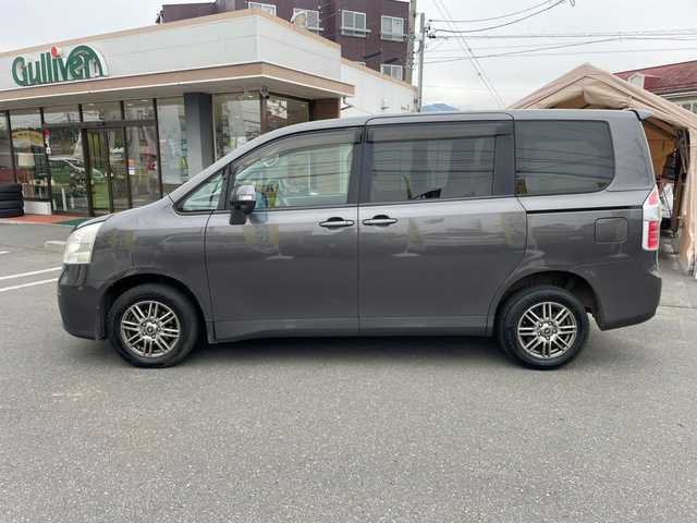 トヨタ ノア X Lセレクション 長野県 2009(平21)年 18.5万km グレーメタリック 社外ナビ(AM/FM/AUX)/電動格納ミラー/両側パワスラ/４WD/取説/記録簿/ABS