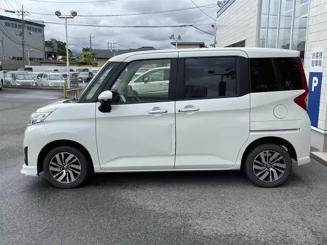 トヨタ ルーミー カスタムG S 山梨県 2017(平29)年 10.6万km パールホワイトⅢ (株)IDOMが運営する【じしゃロン甲府店】の自社ローン専用車両になります。こちらは現金またはオートローンご利用時の価格です。自社ローンご希望の方は別途その旨お申付け下さい/〇プリクラッシュセーフティ/〇純正SDナビ（NSZT-Y6T）/〇CD/DVD/〇Bluetooth接続/〇バックカメラ/〇クルーズコントロール/〇両側パワースライドドア/〇前席シートヒーター/〇純正14インチAW