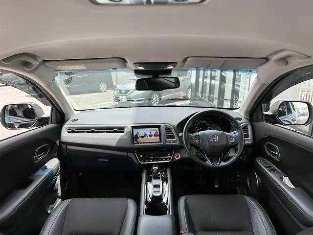 ホンダ ヴェゼル ハイブリッド Z ホンダセンシング 佐賀県 2020(令2)年 4.1万km クリスタルブラックパール ホンダセンシング/純正8インチナビ/・バックカメラ/・フルセグTV/BT/CD/DVD/ハーフレザーシート/前席シートヒーター/純正17インチAW/LEDヘッドライト/フォグランプ/オートライト/ETC/革巻きステアリング/ステアリングスイッチ/パドルシフト/電動格納ミラー/ドアバイザー/フロアマット/エアバックW/サイド/カーテン/スペアキー×１/取扱説明書/保証書