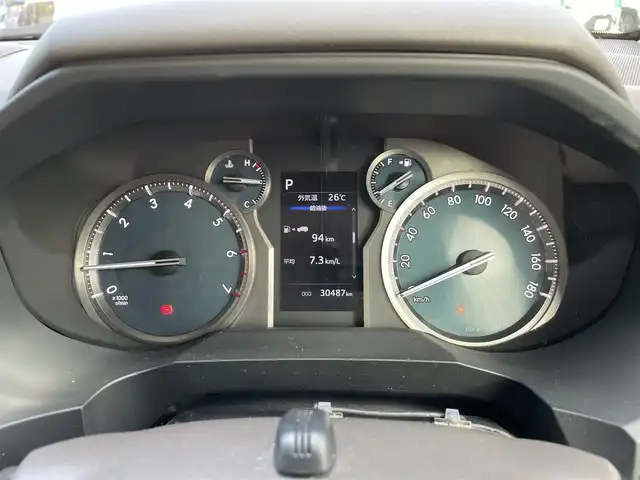 トヨタ ランドクルーザー プラド TX 東京都 2021(令3)年 3.1万km ホワイトパールクリスタルシャイン ワンオーナー/純正9インチSDナビ（NSZT-Y68T）/・Bluetoothオーディオ/USBオーディオ/・フルセグTV/DVD/スライド電動ムーンルーフ/バックカメラ/ルーフレール（ブラック）/Toyota Safety Sense/・プリクラッシュセーフティ/・レーンディパーチャーアラート/・オートライト/オートマチックハイビーム/・レーダークルーズコントロール/木目調（ライトブラウン）ステアリングホイール/寒冷地仕様/ビルトインETC2.0/取扱説明書/保証書