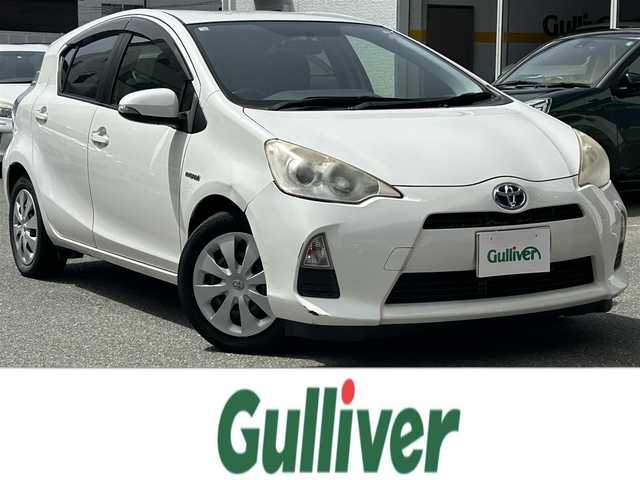 トヨタ アクア G 福岡県 2012(平24)年 15.9万km ライムホワイトパールクリスタルシャイン SDナビ(NSCP-W62)/（ワンセグTV・AM・FM・CD・Bluetooth）/バックカメラ/ETC/前席シートヒーター/革巻きステアリング/プッシュスタートボタン/ウインカーミラー/オートエアコン/スマートキー/オートライト/ドアバイザー/純正フロアマット/横滑り防止装置/盗難防止装置/パワーウィンドゥ/パワーステアリング/ABS/エアーバック（運転席・助手席）