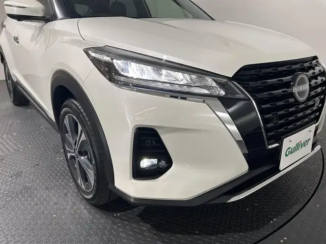 日産 キックス X ツートーンインテリアED 愛媛県 2024(令6)年 0.1万km ブリリアントホワイトパール 純正9インチナビ/フルセグTV/Bluetooth/DVD/プロパイロット/レーダークルーズコントロール/アラウンドビューモニター/デジタルインナーミラー/ビルトインETC/前席シートヒーター/LEDオートライト/レザーハンドル/ステアリングヒーター/ステアリングスイッチ