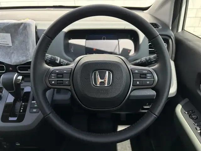ホンダ フリード ハイブリット e:HEV クロスター 福岡県 2025(令7)年 0.1千km プラチナホワイトパール 登録済未使用車純正9インチHondaCONNECTナビ(フルセグTV/BT/AppelCarPlay)バックモニターホンダセンシングコーナーセンサー両側パワスラレーダークルコンBSMリアクーラーシートヒーターオートホールドUSBポート純正LEDヘッドライト純正15インチアルミホイールプッシュスタートスマートキー