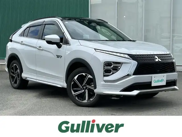 三菱 エクリプス クロス ＰＨＥＶ P 福岡県 2021(令3)年 3.1万km ホワイトダイヤモンド バックカメラ/サンルーフ/フルセグTV/クルーズコントロール/レーンキープアシスト/横滑り防止/前後コーナーセンサー/LEDオートライト/オートハイビーム/衝突被害軽減システム/Apple Car Play/AndroidAuto/BT/パワーシート(D席)/ルーフレール/ハーフレザーシート/シートヒーター(D席＋N席)
