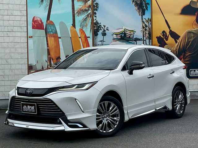 トヨタ ハリアー Z 宮崎県 2021(令3)年 6.3万km ホワイトパールクリスタルシャイン モデリスタフルエアロ/JBLサウンド/ヘッドアップディスプレイ/メーカーナビ/全方位カメラ/デジタルインナーミラー/ブラウンシートカバー/ワンオーナー/パワーバックドア/ETC2.0/クリアランスソナー/レーダークルーズコントロール/プリクラッシュセーフティー/レーンキープアシスト/RCTA/BSM/オートハイビーム/シルクブレイズラゲッジマット/リア3面スモークフィルム/スペアキー/保証書・取扱説明書