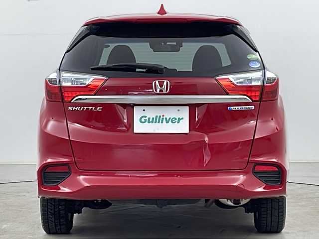 ホンダ シャトル ハイブリッド X 道央・札幌 2015(平27)年 7万km ミラノレッド ・４WD/・シティブレーキアクティブシステム/・クルーズコントロール/・横滑り防止装置/・パドルシフト/・車両接近通報装置/・チップアップリヤシート/・熱線入りフロントウインドウ/・純正ナビ/（CD/DVD/フルセグ/Bluetooth）/・ステアリングスイッチ/・バックカメラ/・ETC/・純正ドライブレコーダー/・オートエアコン/・オートライト/・LEDヘッドライト/・フォグランプ/・社外15インチアルミホイール