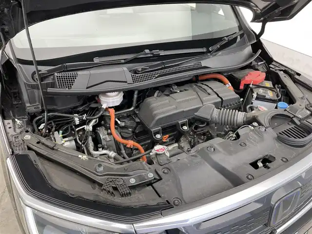 ホンダ ステップワゴン スパーダ eHEV プレミアムライン 滋賀県 2023(令5)年 3.5万km クリスタルブラックパール 純正11.4インチナビ/(CD/DVD/フルセグ/Bluetooth)/マルチビューカメラ/純正15.6インチフリップダウンモニター/ハーフレザーシート/1.2列目シートヒーター/両側電動スライド/電動リアゲート/前後ドラレコ/コーナーセンサー/追従クルーズコントロール/ETC/オットマン/LEDヘッドライト/オートライト