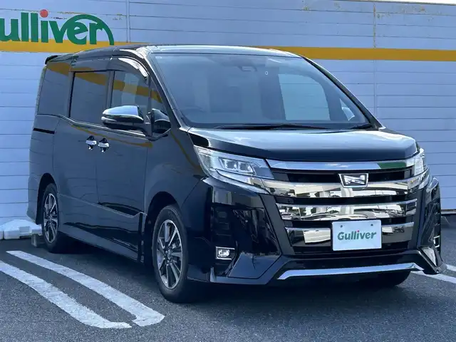 トヨタ ノア Si ダブルバイビーⅢ 埼玉県 2021(令3)年 2.9万km ブラック ワンオーナー/バックカメラ/アイドリングストップ/衝突被害軽減ブレーキ/レーンアシスト/横滑り防止装置/純正ディーラーナビ/クルーズコントロール/クリアランスソナー/フロアマット/オートライト/オートハイビーム/パーキングアシスト/ドライブレコーダー/ETC/USB接続端子/両側イージークローザードア/プッシュスタート/フルセグテレビ/Bluetooth接続/DVD再生/WAC/ABS/PW/PS/純正アルミホイール/ドアバイザー