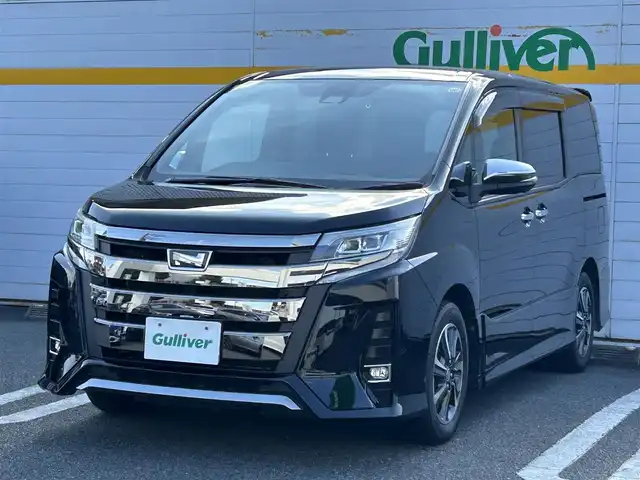 トヨタ ノア Si ダブルバイビーⅢ 埼玉県 2021(令3)年 2.9万km ブラック ワンオーナー/バックカメラ/アイドリングストップ/衝突被害軽減ブレーキ/レーンアシスト/横滑り防止装置/純正ディーラーナビ/クルーズコントロール/クリアランスソナー/フロアマット/オートライト/オートハイビーム/パーキングアシスト/ドライブレコーダー/ETC/USB接続端子/両側イージークローザードア/プッシュスタート/フルセグテレビ/Bluetooth接続/DVD再生/WAC/ABS/PW/PS/純正アルミホイール/ドアバイザー