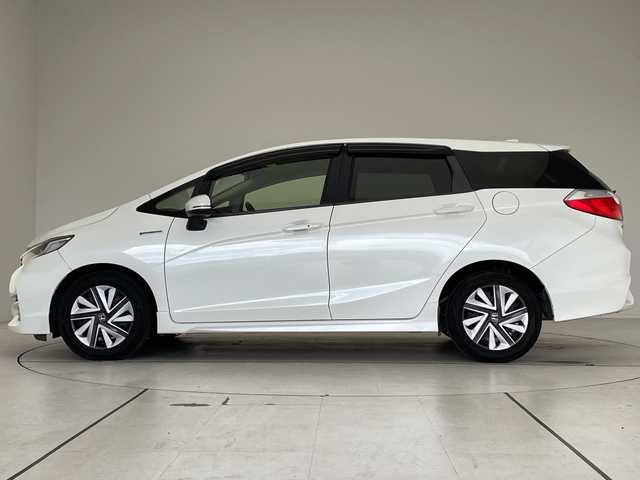 ホンダ シャトル ハイブリッド X 愛知県 2016(平28)年 6.6万km ホワイトオーキッドパール シティーブレーキアクティブシステム/SDナビ/クルーズコントロール/バックカメラ/フルセグ/CD DVD/Bluetooth/ETC/パドルシフト/ハーフレザー/LEDヘッドライト/ステアリングスイッチ/スマートキー/プッシュスタート