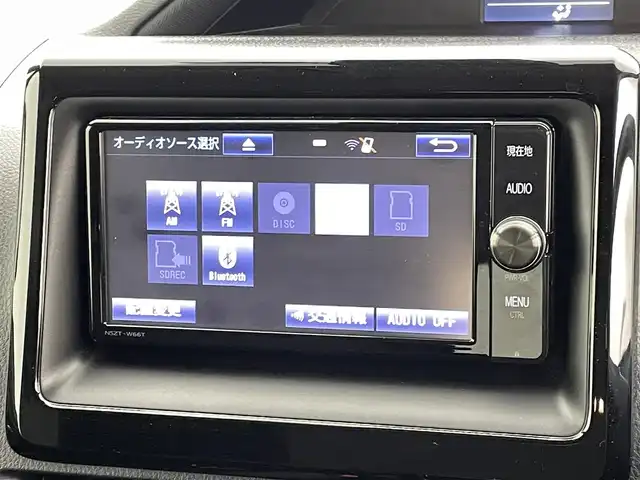 トヨタ ノア Si 熊本県 2016(平28)年 6万km ホワイトパールクリスタルシャイン 禁煙車　/純正ナビ（ＣＤ・ＤＶＤ・フルセグ・ＢＴ・ＳＤ）/バックカメラ　/社外前後ドライブレコーダー（ZDR025）　/社外フリップダウンモニター/ビルトインＥＴＣ　/両側パワースライドドア　/アイドリングストップ　/衝突軽減ブレーキ　/レーンキープアシスト/横滑り防止/純正フロアマット/純正16インチAW/オートライト/オートマチックハイビーム/LEDヘッドライト/フォグライト/スマートキー/プッシュスタート/スペアキー1本