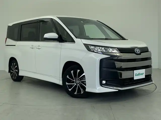トヨタ ノア ハイブリッド S－Z 愛知県 2023(令5)年 1.9万km ホワイトパールクリスタルシャイン 純正8型ディスプレイオーディオ/・Bluetooth/・AppleCarPlay/バックカメラ/両側パワースライドドア/シートヒーター/レーダークルーズコントロール　/衝突軽減ブレーキ/レーンキープアシスト/オートマチックハイビーム/前後コーナーセンサー/ハーフレザーシート/純正17インチアルミホイール/ビルトインＥＴＣ２．０　/LEDヘッドライト/スマートキー