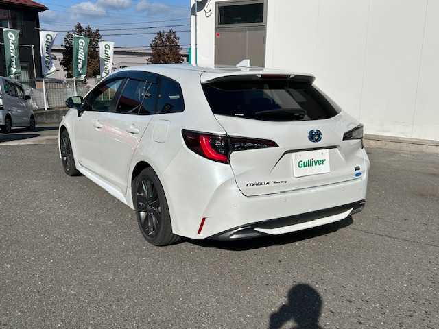 トヨタ カローラツーリング ハイブリッド ダブルバイビー 宮城県 2024(令6)年 1.1万km プラチナホワイトパールマイカ ワンオーナー　/４ＷＤ　/レーダークルーズコントロール　/純正ナビゲーション/　（Bluetooth　インターネット　フルセグテレビ）/ドライブレコーダー　/ＥＴＣ２．０　/プリクラッシュセーフティ　/マルチインフォメーションディスプレイ　/オートライト/オートハイビーム/純正フロアマット/バックカメラ/純正アルミホイール/保証書/取扱説明書