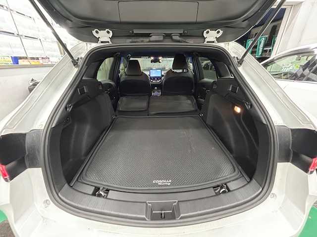 トヨタ カローラツーリング ハイブリッド ダブルバイビー 宮城県 2024(令6)年 1.1万km プラチナホワイトパールマイカ ワンオーナー　/４ＷＤ　/レーダークルーズコントロール　/純正ナビゲーション/　（Bluetooth　インターネット　フルセグテレビ）/ドライブレコーダー　/ＥＴＣ２．０　/プリクラッシュセーフティ　/マルチインフォメーションディスプレイ　/オートライト/オートハイビーム/純正フロアマット/バックカメラ/純正アルミホイール/保証書/取扱説明書