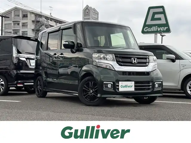 ホンダ Ｎ ＢＯＸ カスタムG SSブラックスタイル 大分県 2017(平29)年 9万km ブリティッシュグリーンP ・社外ナビ(CD.DVD.SD.BT)/・バックカメラ/・フルセグテレビ/・両側パワースライドドア/・ETC/・シートヒーター/・ステアリングリモコン/・スマートキー/・スペアキー