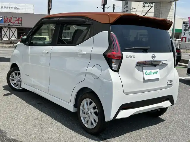 日産 デイズ ハイウェイスターX 奈良県 2022(令4)年 0.2万km プレミアムサンシャインオレンジメタリック/シルキーホワイト 純正9インチナビ/(BT/DVD/CD)/フルセグTV/ミラー型全方位カメラ/ナビ連動ドラレコ/エマージェンシーブレーキ/車線逸脱警報/標識認識/ETC2.0/革巻きステアリング/純正14インチAW/LEDオートライト/フォグライト/電格ミラー