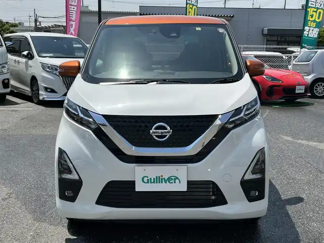 日産 デイズ ハイウェイスターX 奈良県 2022(令4)年 0.2万km プレミアムサンシャインオレンジメタリック/シルキーホワイト 純正9インチナビ/(BT/DVD/CD)/フルセグTV/ミラー型全方位カメラ/ナビ連動ドラレコ/エマージェンシーブレーキ/車線逸脱警報/標識認識/ETC2.0/革巻きステアリング/純正14インチAW/LEDオートライト/フォグライト/電格ミラー