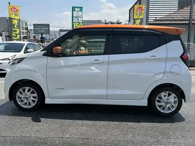日産 デイズ ハイウェイスターX 奈良県 2022(令4)年 0.2万km プレミアムサンシャインオレンジメタリック/シルキーホワイト 純正9インチナビ/(BT/DVD/CD)/フルセグTV/ミラー型全方位カメラ/ナビ連動ドラレコ/エマージェンシーブレーキ/車線逸脱警報/標識認識/ETC2.0/革巻きステアリング/純正14インチAW/LEDオートライト/フォグライト/電格ミラー
