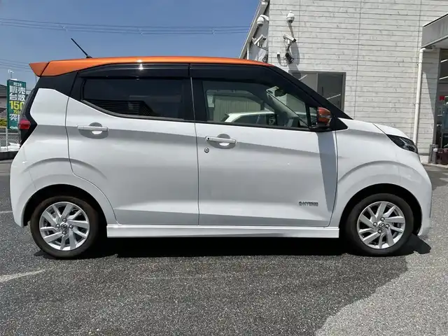 日産 デイズ ハイウェイスターX 奈良県 2022(令4)年 0.2万km プレミアムサンシャインオレンジメタリック/シルキーホワイト 純正9インチナビ/(BT/DVD/CD)/フルセグTV/ミラー型全方位カメラ/ナビ連動ドラレコ/エマージェンシーブレーキ/車線逸脱警報/標識認識/ETC2.0/革巻きステアリング/純正14インチAW/LEDオートライト/フォグライト/電格ミラー