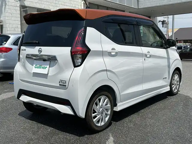 日産 デイズ ハイウェイスターX 奈良県 2022(令4)年 0.2万km プレミアムサンシャインオレンジメタリック/シルキーホワイト 純正9インチナビ/(BT/DVD/CD)/フルセグTV/ミラー型全方位カメラ/ナビ連動ドラレコ/エマージェンシーブレーキ/車線逸脱警報/標識認識/ETC2.0/革巻きステアリング/純正14インチAW/LEDオートライト/フォグライト/電格ミラー