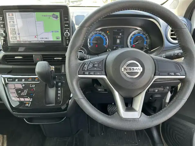 日産 デイズ ハイウェイスターX 奈良県 2022(令4)年 0.2万km プレミアムサンシャインオレンジメタリック/シルキーホワイト 純正9インチナビ/(BT/DVD/CD)/フルセグTV/ミラー型全方位カメラ/ナビ連動ドラレコ/エマージェンシーブレーキ/車線逸脱警報/標識認識/ETC2.0/革巻きステアリング/純正14インチAW/LEDオートライト/フォグライト/電格ミラー