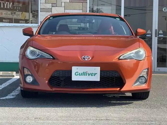 トヨタ ８６ GT 徳島県 2015(平27)年 2.9万km オレンジメタリック ケンウッドメモリナビ　MDVーZ701W/(AM.FM.CD.BT.TV)/クルーズコントロール/純正アルミホイール/ＨＩＤヘッドライト/純正フロアマット/前方ドライブレコーダー MDVーZ701W/オートライト/オートエアコン/６速マニュアル/プッシュスタート