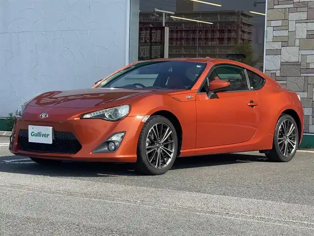 トヨタ ８６ GT 徳島県 2015(平27)年 2.9万km オレンジメタリック ケンウッドメモリナビ　MDVーZ701W/(AM.FM.CD.BT.TV)/クルーズコントロール/純正アルミホイール/ＨＩＤヘッドライト/純正フロアマット/前方ドライブレコーダー MDVーZ701W/オートライト/オートエアコン/６速マニュアル/プッシュスタート