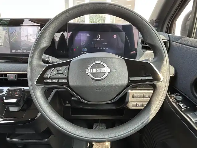 日産 サクラ X 兵庫県 2024(令6)年 0.3万km ブラック 純正ナビ　/USB入力端子　/AppleCarPlay　/全方位バックモニター/プロパイロット　/先進安全装備360°セーフティアシスト/インテリジェントエマージェンシーブレーキ/踏み間違え防止アシスト/車線逸脱防止支援システム/ふらつき警報/標識認識機能/ＬＥＤヘッドライト　/アイドリングストップ　/オートライト　/横滑り防止システム　/純正フロアマット