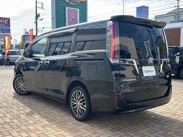 トヨタ エスクァイア ハイブリッド Gi プレミアムパッケージ 鳥取県 2020(令2)年 6万km ブラック ワンオーナー/７人乗り/ハーフレザーシート/ウッドコンビハンドル/両側パワースライド/純正８インチワイドナビ/フリップダウンモニター/フルセグ・Bluetooth/バックカメラ/前後ドライブレコーダー/プリクラッシュセーフティ/クリアランスソナー/レーンデパーチャー/オートハイビーム/クルーズコントロール/前席シートヒーター/ハンドルヒーター/LEDイルミネーション/nano-eエアコン/リアオートエアコン/センターコンソール/ハイマウントスピーカー/LEDヘッドライト/LEDフォグライト/オートリトラクトミラー/社外17インチAW(ワーク製）/社外ダブルホーン/ETCユニット/保証書・取説