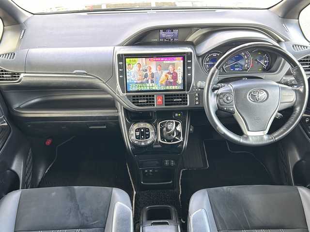 トヨタ エスクァイア ハイブリッド Gi プレミアムパッケージ 鳥取県 2020(令2)年 6万km ブラック ワンオーナー/７人乗り/ハーフレザーシート/ウッドコンビハンドル/両側パワースライド/純正８インチワイドナビ/フリップダウンモニター/フルセグ・Bluetooth/バックカメラ/前後ドライブレコーダー/プリクラッシュセーフティ/クリアランスソナー/レーンデパーチャー/オートハイビーム/クルーズコントロール/前席シートヒーター/ハンドルヒーター/LEDイルミネーション/nano-eエアコン/リアオートエアコン/センターコンソール/ハイマウントスピーカー/LEDヘッドライト/LEDフォグライト/オートリトラクトミラー/社外17インチAW(ワーク製）/社外ダブルホーン/ETCユニット/保証書・取説
