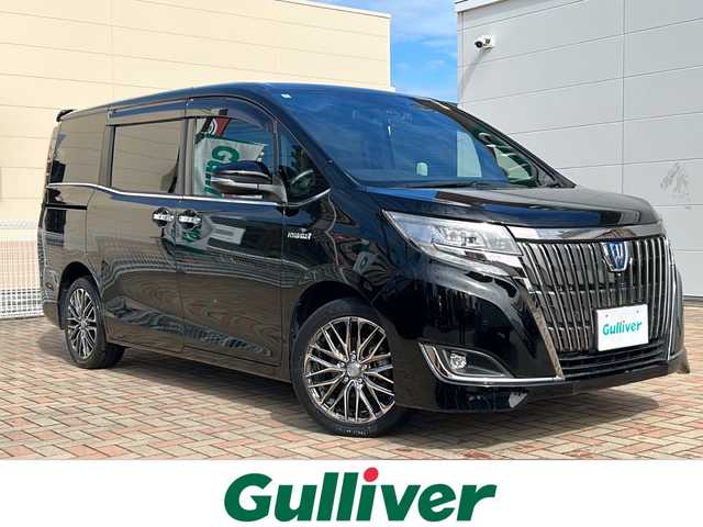 トヨタ エスクァイア ハイブリッド Gi プレミアムパッケージ 鳥取県 2020(令2)年 6万km ブラック ワンオーナー/７人乗り/ハーフレザーシート/ウッドコンビハンドル/両側パワースライド/純正８インチワイドナビ/フリップダウンモニター/フルセグ・Bluetooth/バックカメラ/前後ドライブレコーダー/プリクラッシュセーフティ/クリアランスソナー/レーンデパーチャー/オートハイビーム/クルーズコントロール/前席シートヒーター/ハンドルヒーター/LEDイルミネーション/nano-eエアコン/リアオートエアコン/センターコンソール/ハイマウントスピーカー/LEDヘッドライト/LEDフォグライト/オートリトラクトミラー/社外17インチAW(ワーク製）/社外ダブルホーン/ETCユニット/保証書・取説