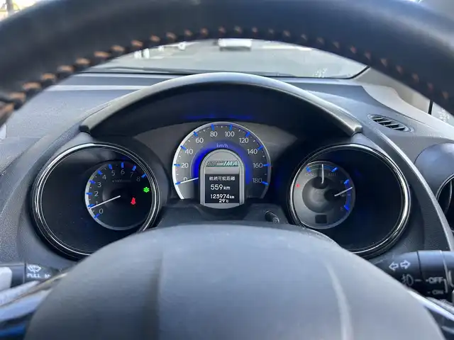ホンダ フィット シャトル ハイブリッド スマートセレ 静岡県 2013(平25)年 12.4万km プレミアムディープロッソパール ディーラー純正ナビ/BT/ワンセグTV /CD/DVD/USB/ETC/クルコン/純正フロアマット/AW/バックカメラ/前後ドラレコ/シートヒーターD＋N/ハーフレザーシート/パドルシフト